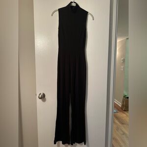 Reformation Ribbed Mock Neck Flare Jumpsuit in Black, Size XS